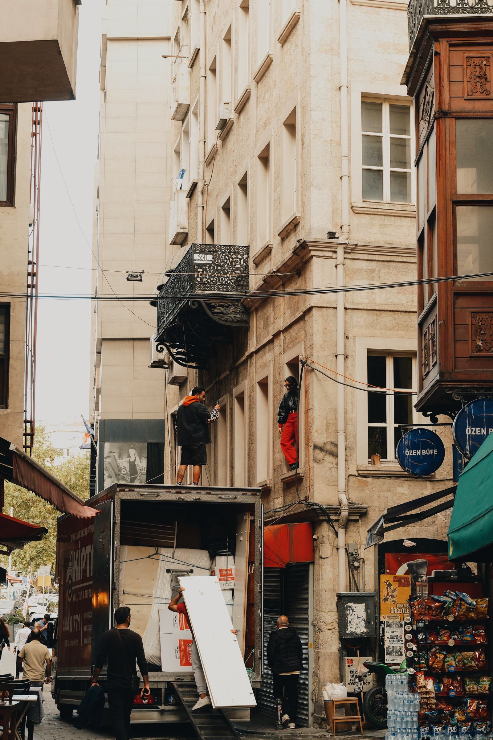 Acme Removals movers loading a removal truck on an Adelaide street