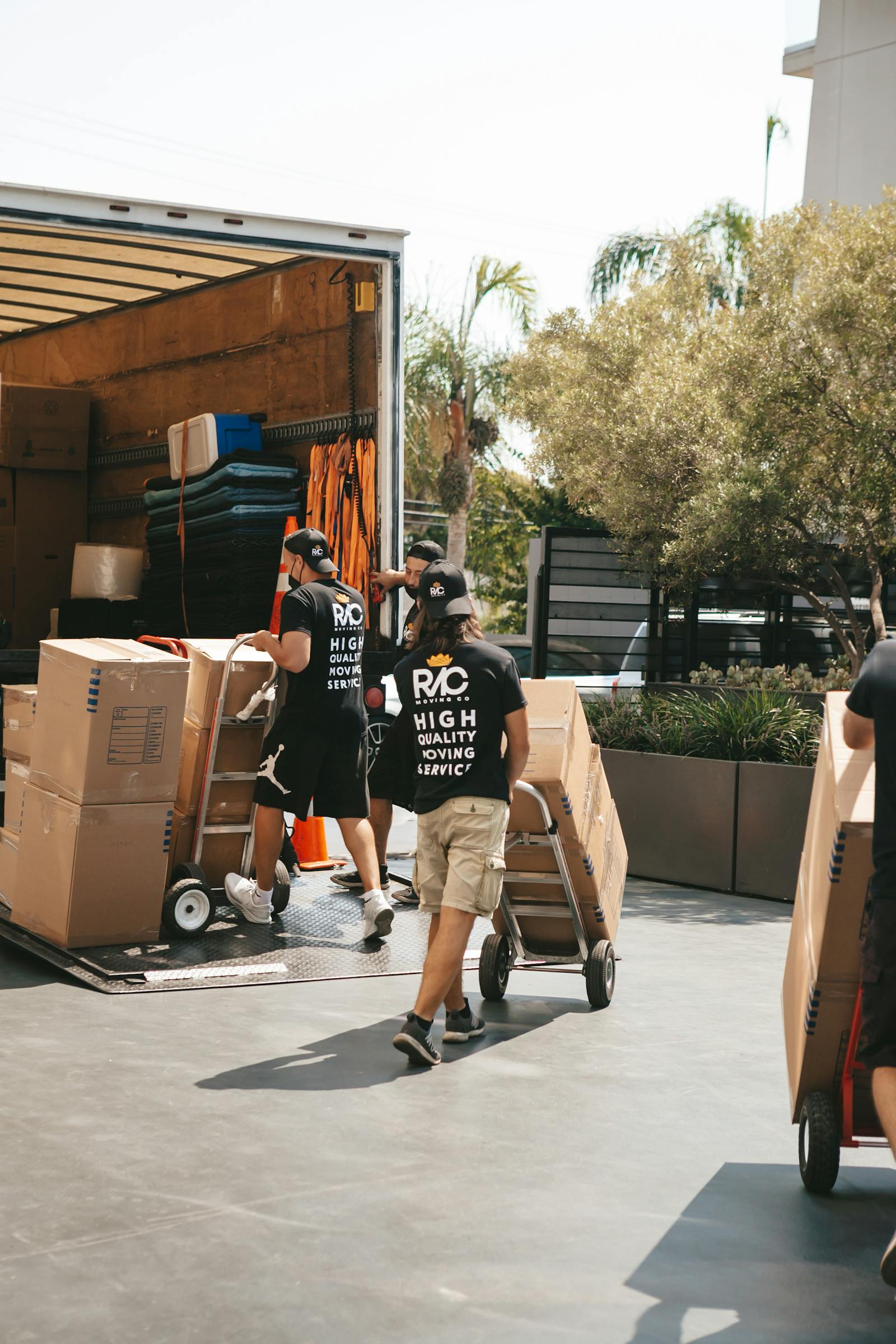 Removalists loading a truck for an interstate move